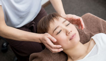 Headache pain relief with massage and chiro